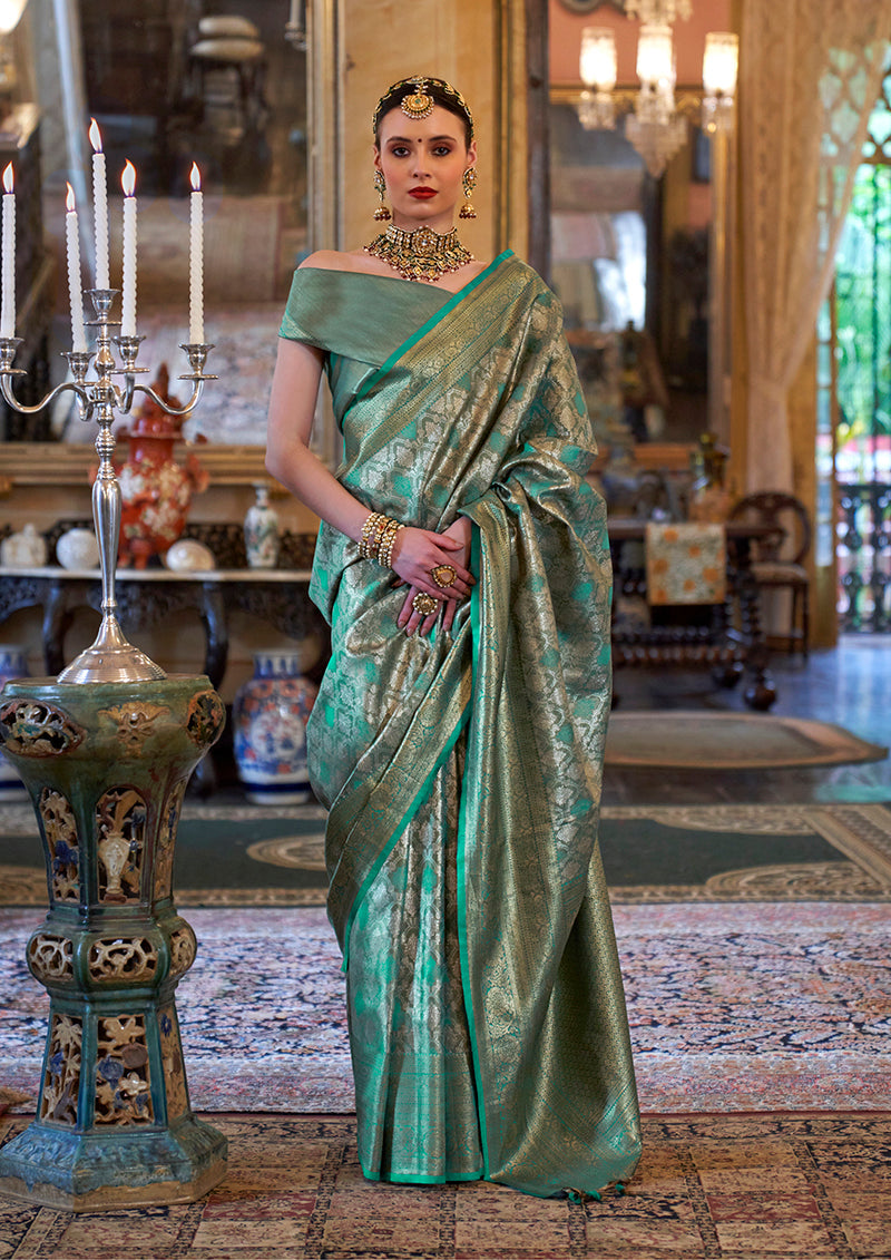 Monjolika Fashion Kanjivaram Silk Blend Classic Saree with Woven Work for Women in Teal