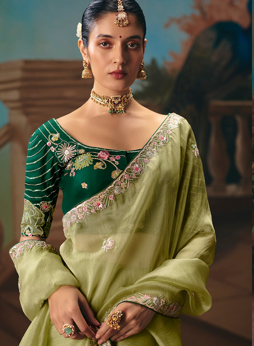 Monjolika Fashion Light Olive Green Fancy Fabric Saree With Embroidered Work