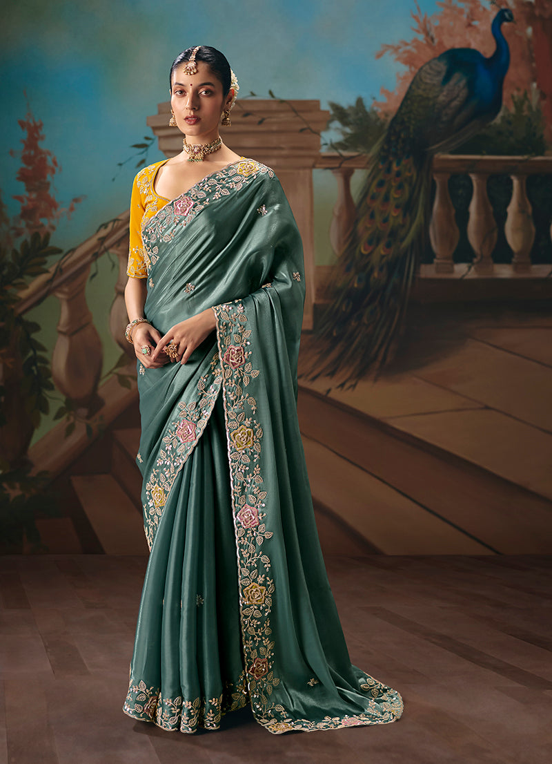 Monjolika Fashion Teal Fancy Fabric Saree With Embroidered Work