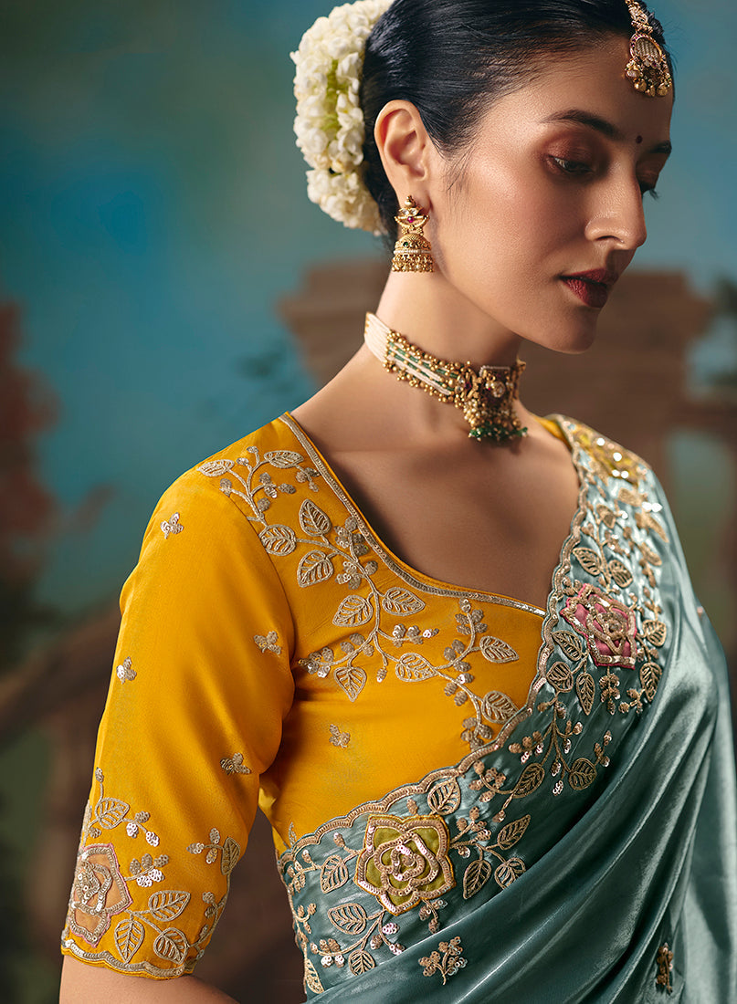 Monjolika Fashion Teal Fancy Fabric Saree With Embroidered Work