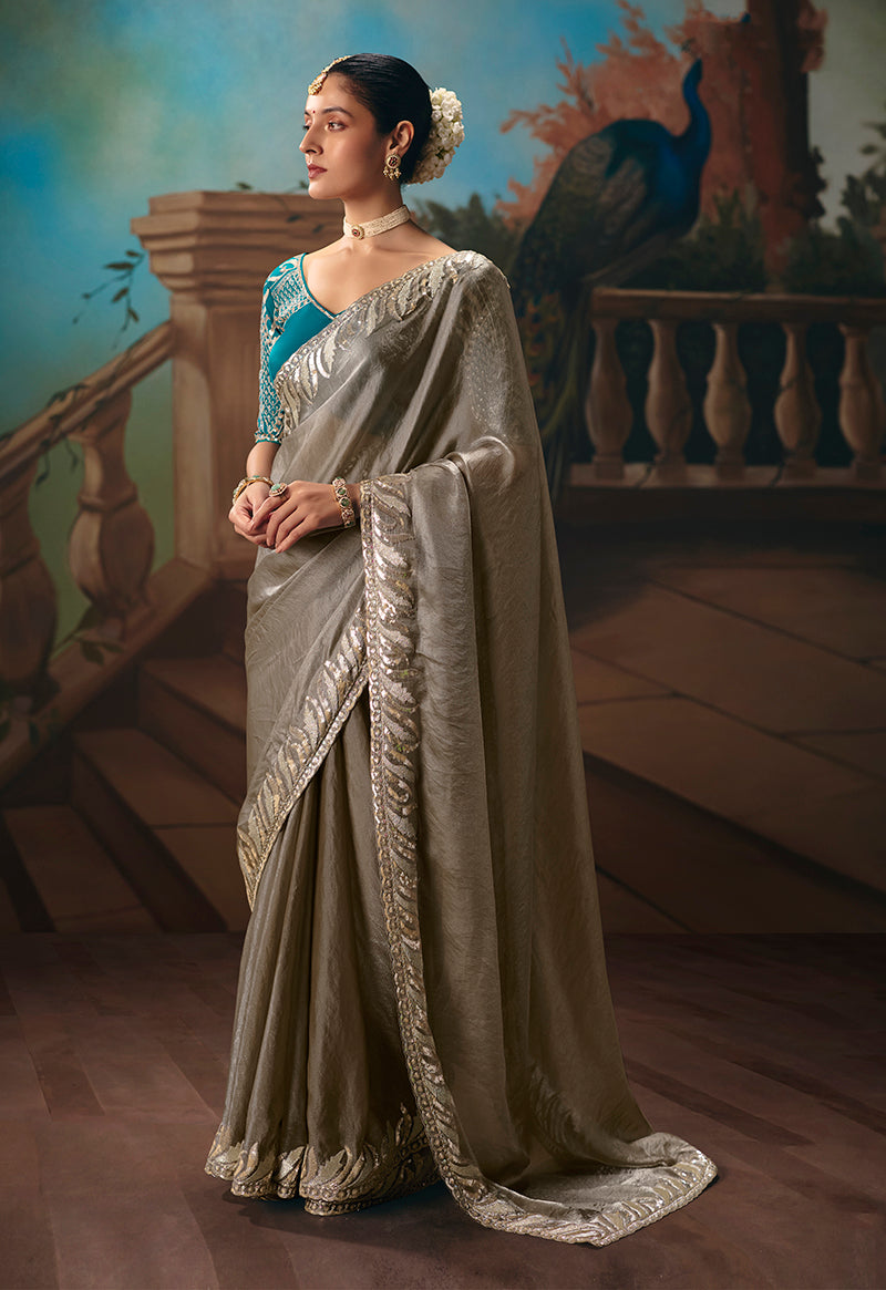 Monjolika Fashion Grey Fancy Fabric Saree With Embroidered Work