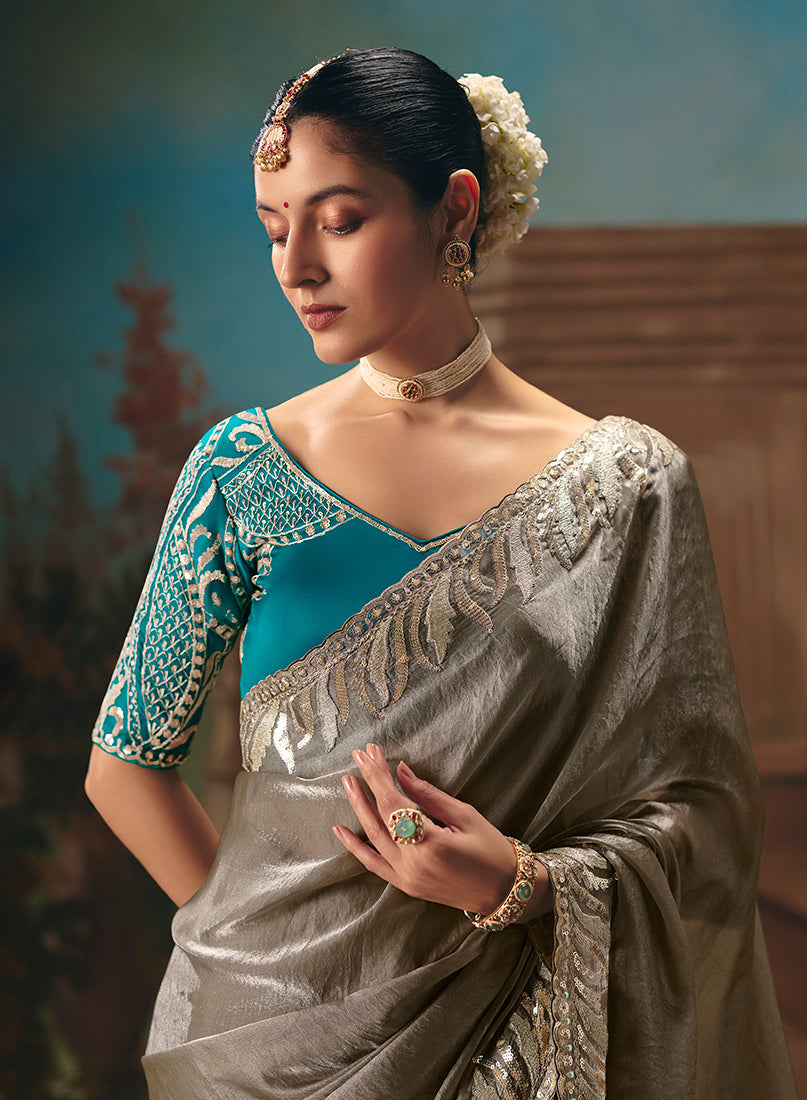 Monjolika Fashion Grey Fancy Fabric Saree With Embroidered Work