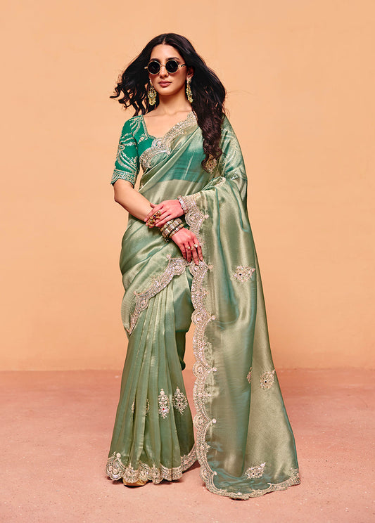 Monjolika Fashion Sea Green Faux Organza Satin Saree With Embroidery