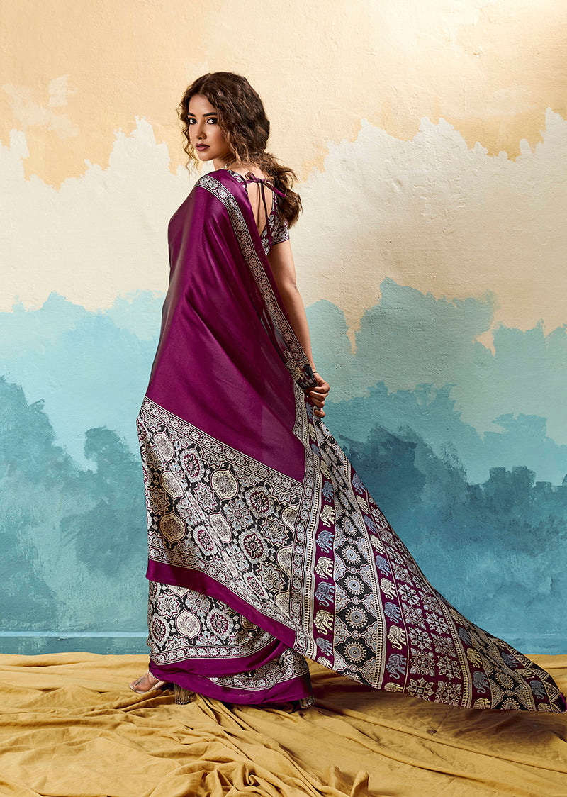 Monjolika Fashion Ajrakh Wine Faux Satin Printed Saree With Ethnic Motif