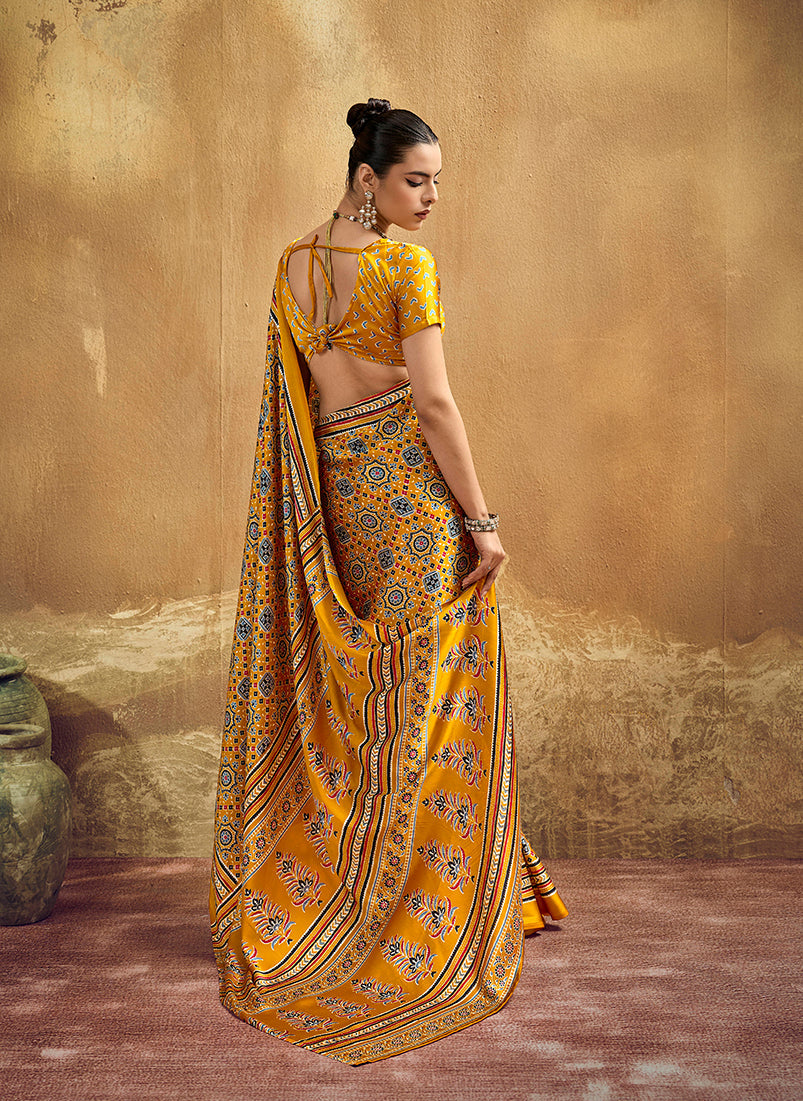 Monjolika Fashion Mustard Pink Faux Satin Printed Ajrakh Saree With Rich Border Print