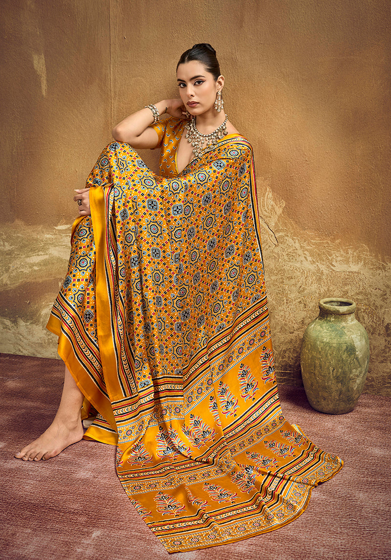 Monjolika Fashion Mustard Pink Faux Satin Printed Ajrakh Saree With Rich Border Print