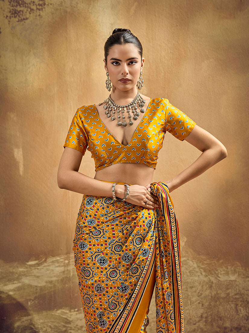 Monjolika Fashion Mustard Pink Faux Satin Printed Ajrakh Saree With Rich Border Print