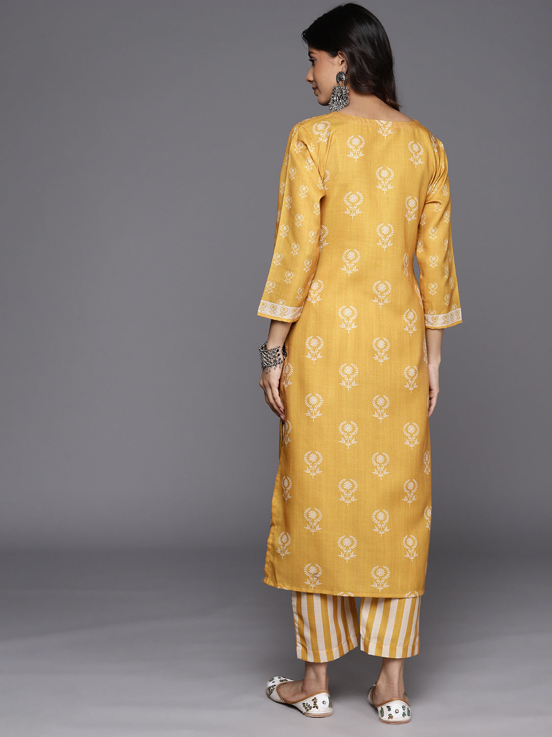 KSUT (House of Varanga) Mustard Digital Printed Kurta With V Neckline Paired With Straight Trouser