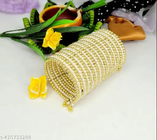 Tehzeeb Creations Women's Spiral Bangle With Golden And White Pearl | Grab2Buy