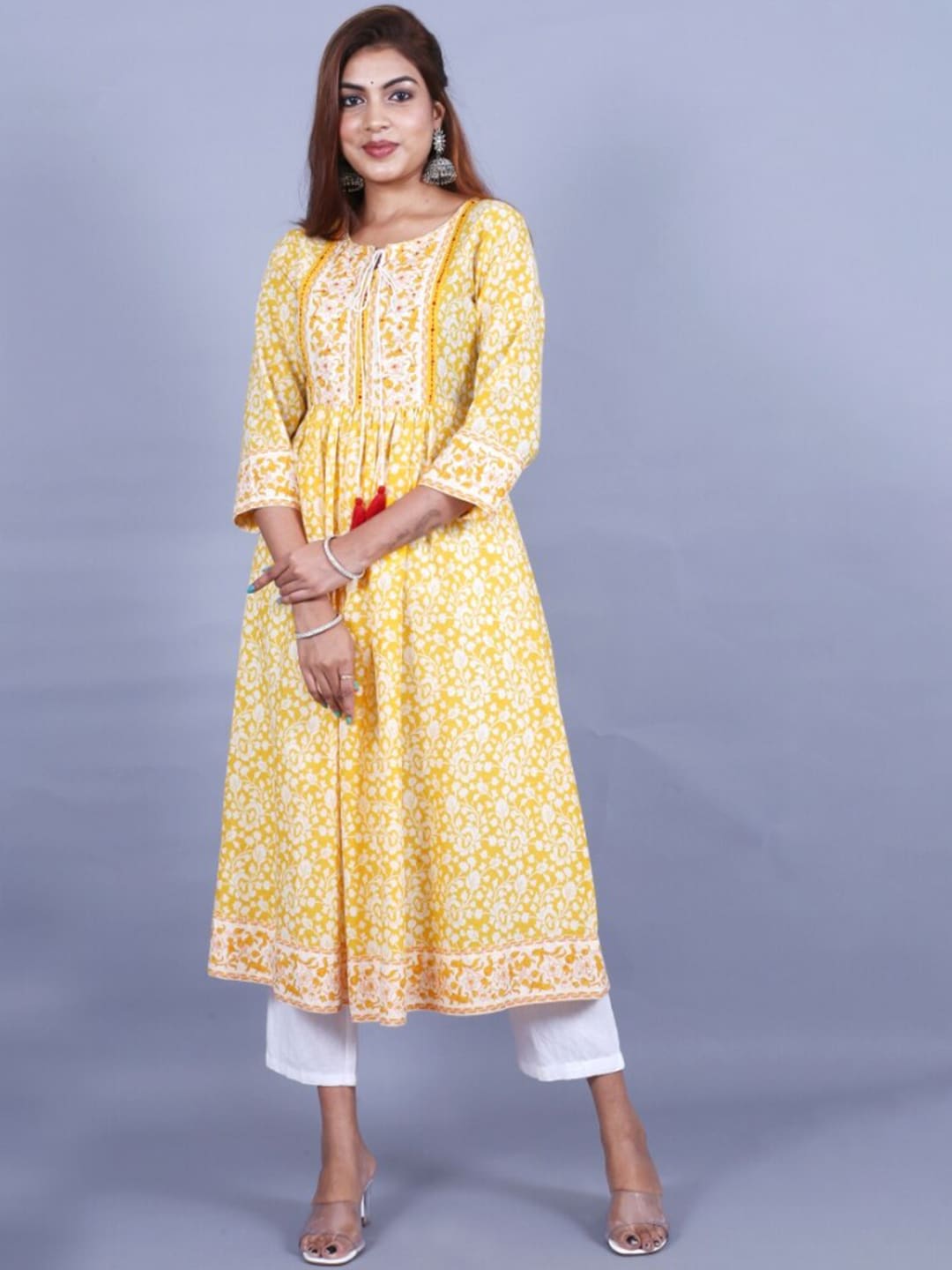 HERE&NOW Women Yellow Floral Printed Sequined A-Line Kurta with Trousers