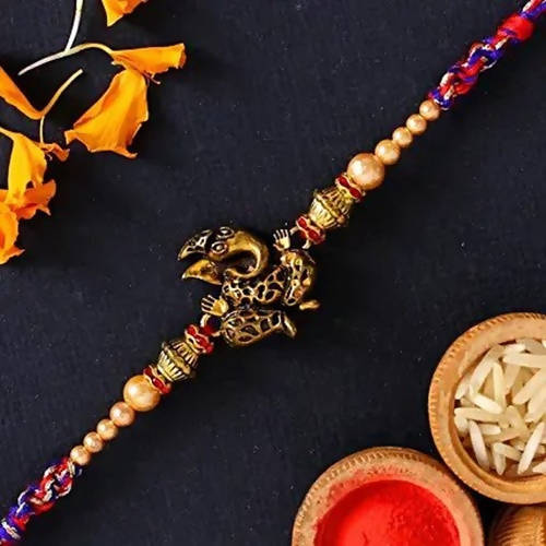 Ganesha Rakhi & Cadbury Silk In Mera Bhai Sleeve