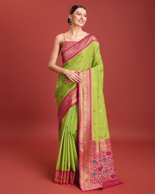 Monjolika Fashion Exquisite Designs With This Regal Parrot Green Patola Pallu Banarasi Tissue Silk Saree