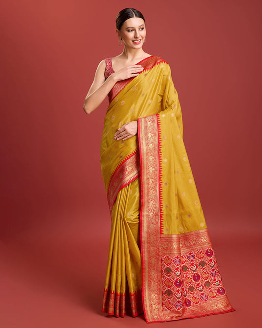 Monjolika Fashion Exquisite Designs With This Regal Mustard Color Patola Pallu Banarasi Tissue Silk Saree