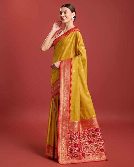 Monjolika Fashion Exquisite Designs With This Regal Mustard Color Patola Pallu Banarasi Tissue Silk Saree