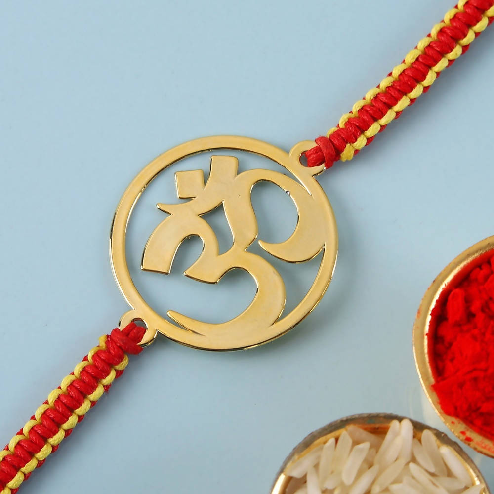 Ethnic Om Metal Rakhi & Dairy Milk Chocolates