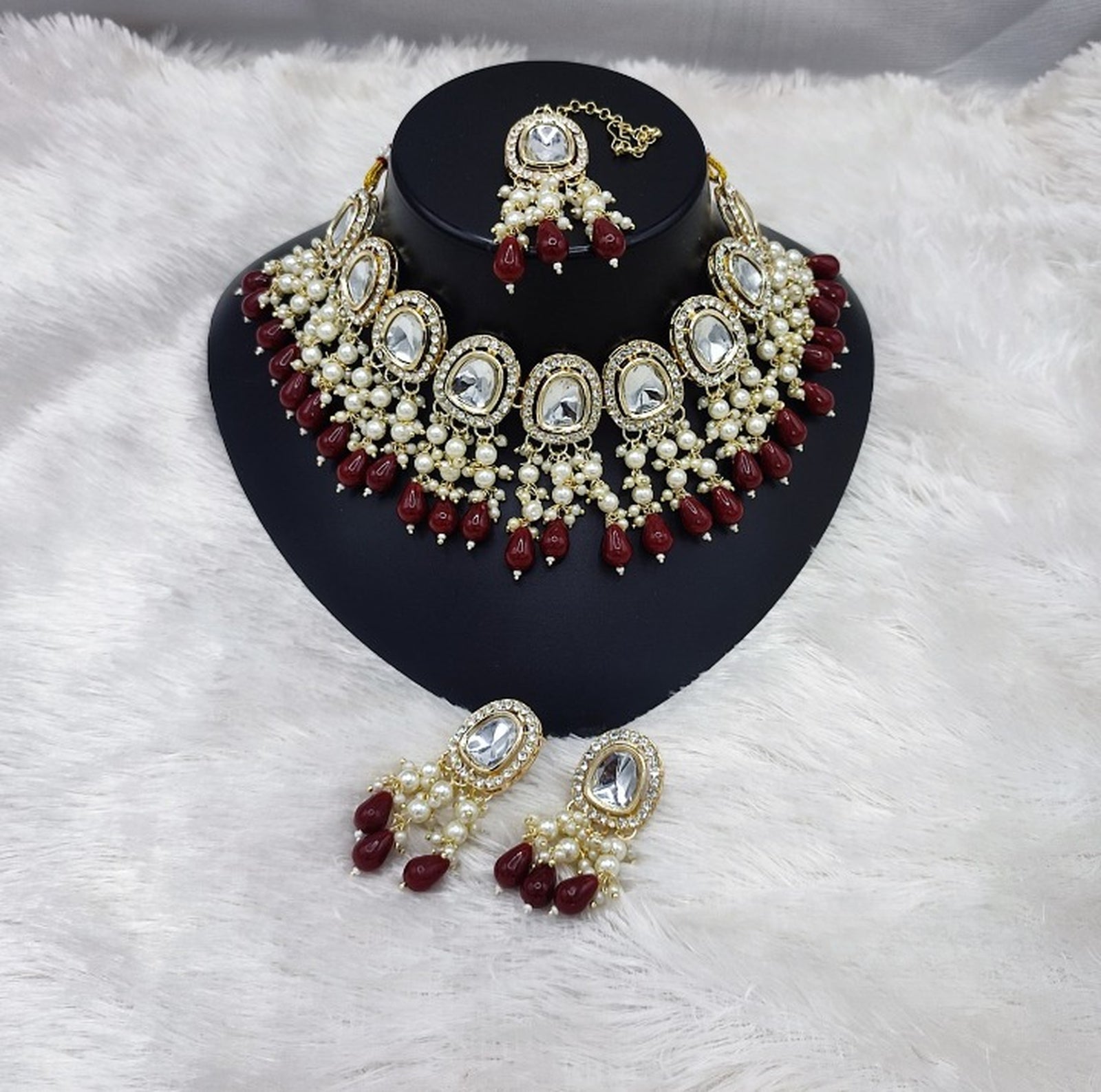 Jewel City Elegant Kundan Pearl Necklace Set with Maroon Drops and Matching Tikka | Grab2Buy