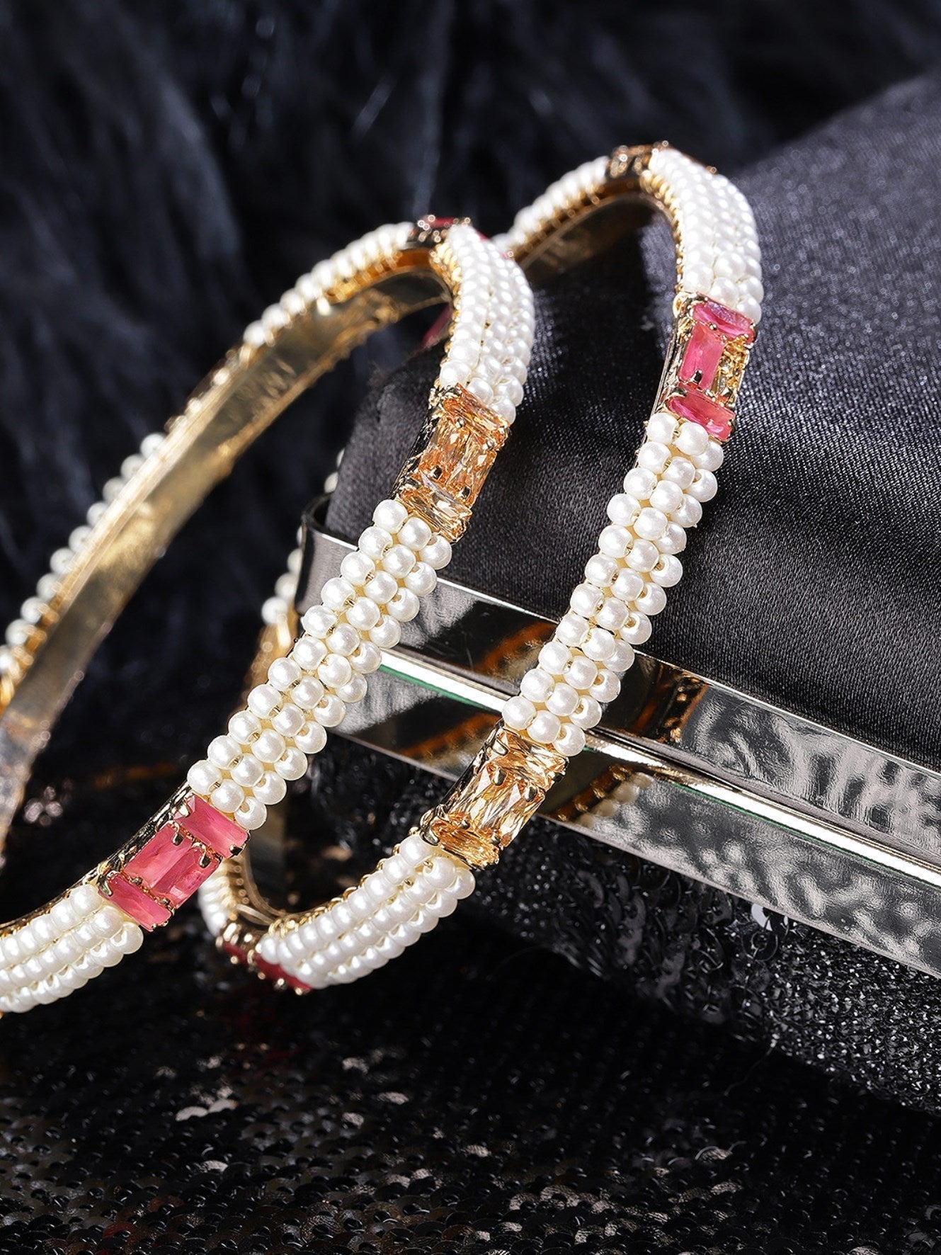 Priyaasi Women Set Of 2 Gold-Polished Pearls and Stones Studded Bangles in Pink and White Color 