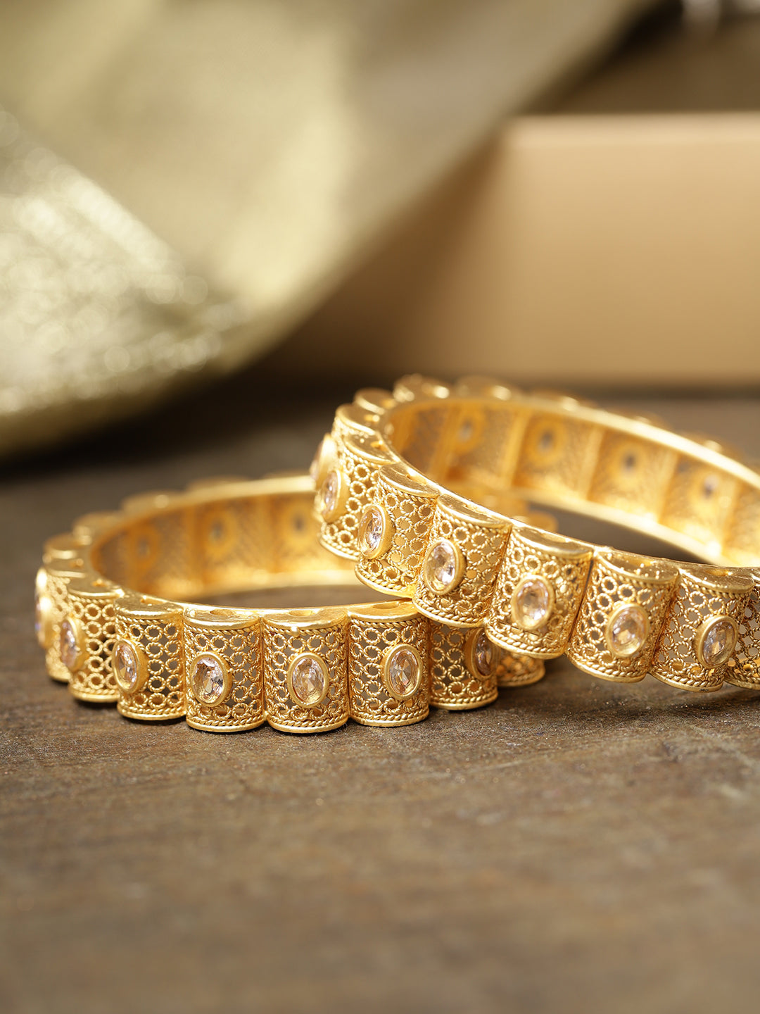 Priyaasi Women Set Of 2 Gold-Polished Stones Studded Jali Work Bangles 