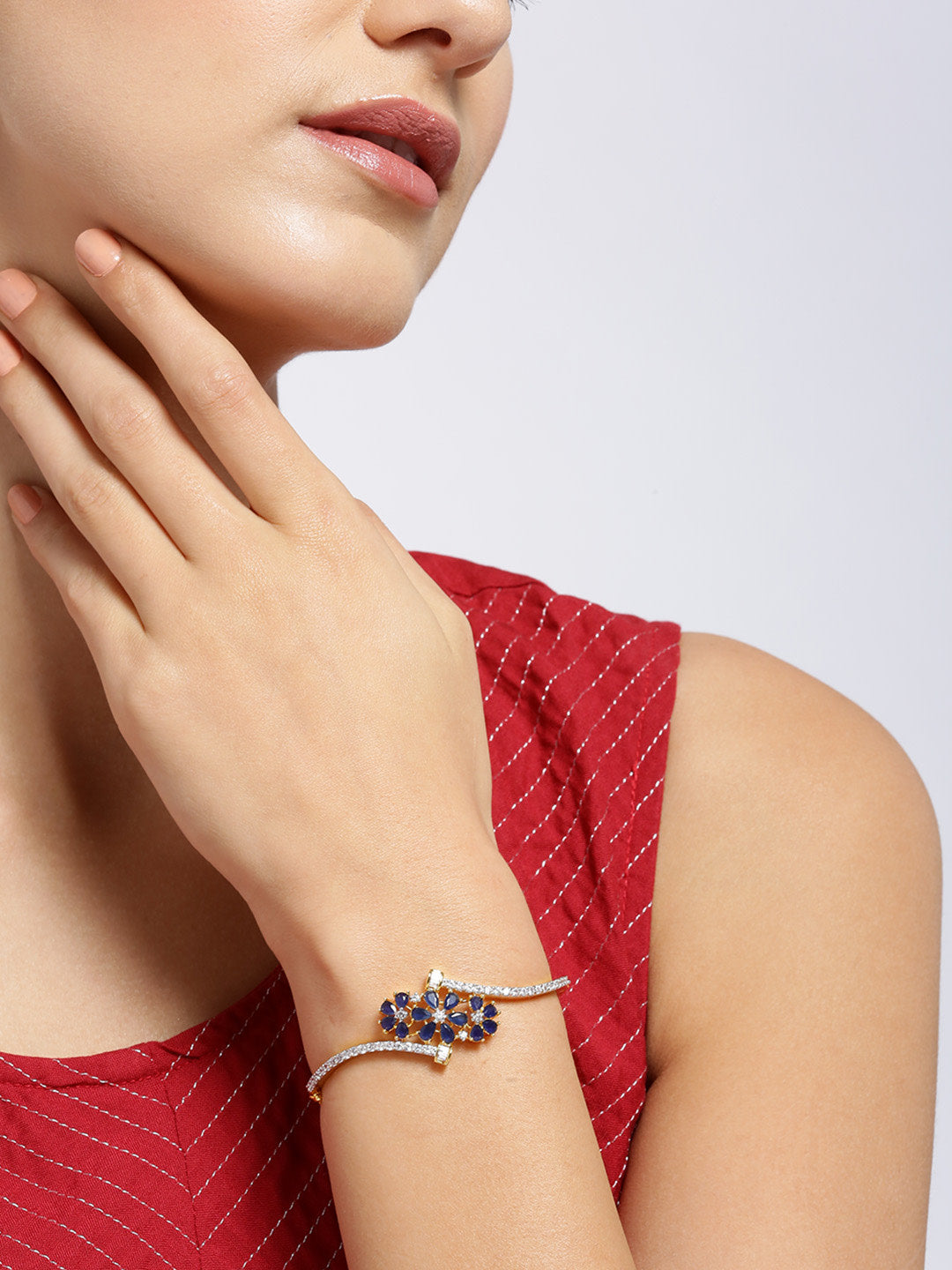 Priyaasi Women Gold-Polished American Diamond Studded, Floral Patterned Bracelet in Blue Color 