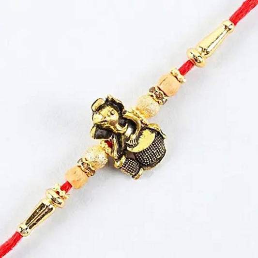 Devotional Lord Ganesha Rakhi & 2 Dairy Milk Silk