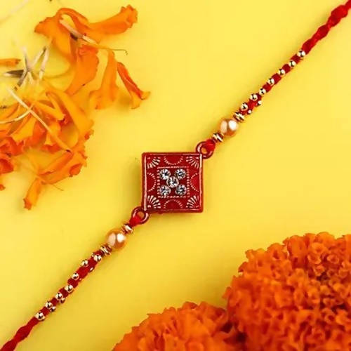 Sleek American Diamond Rakhi And Cashew Jar