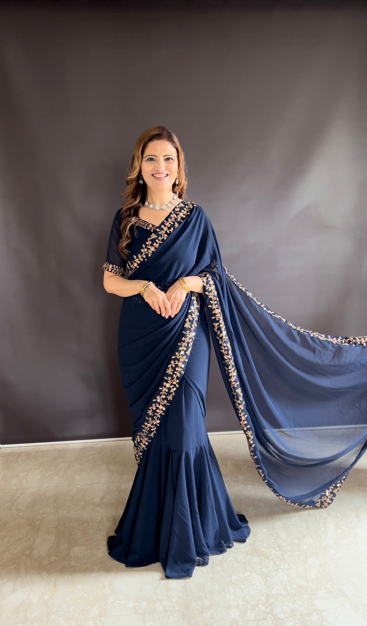 Teeya Creation Blue Color Faux Georgette Fabric Heavy Embroidery Work Gown Style Fully Stitched Saree