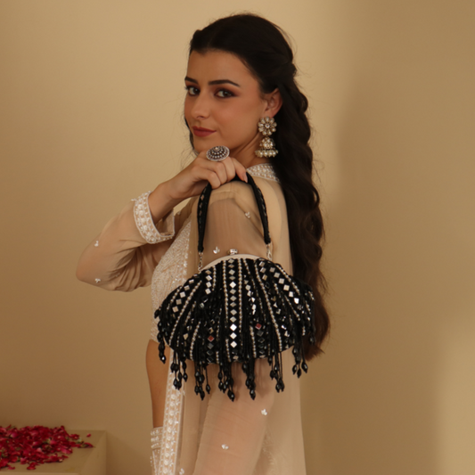 New Stylish Partywear Black Mirror Work Potli Bag for Womens by House of Ree