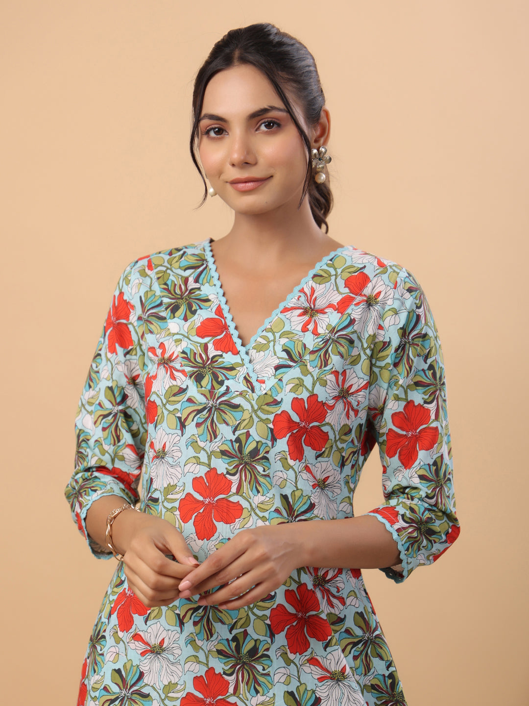 Janasya A-Line Cambric Blue Floral V-Neck Kurta & Bottom 