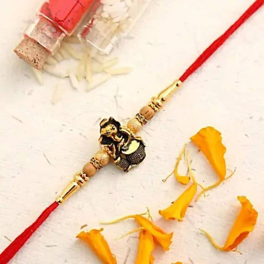 Devotional Lord Ganesha Rakhi & Kaju Roll Box