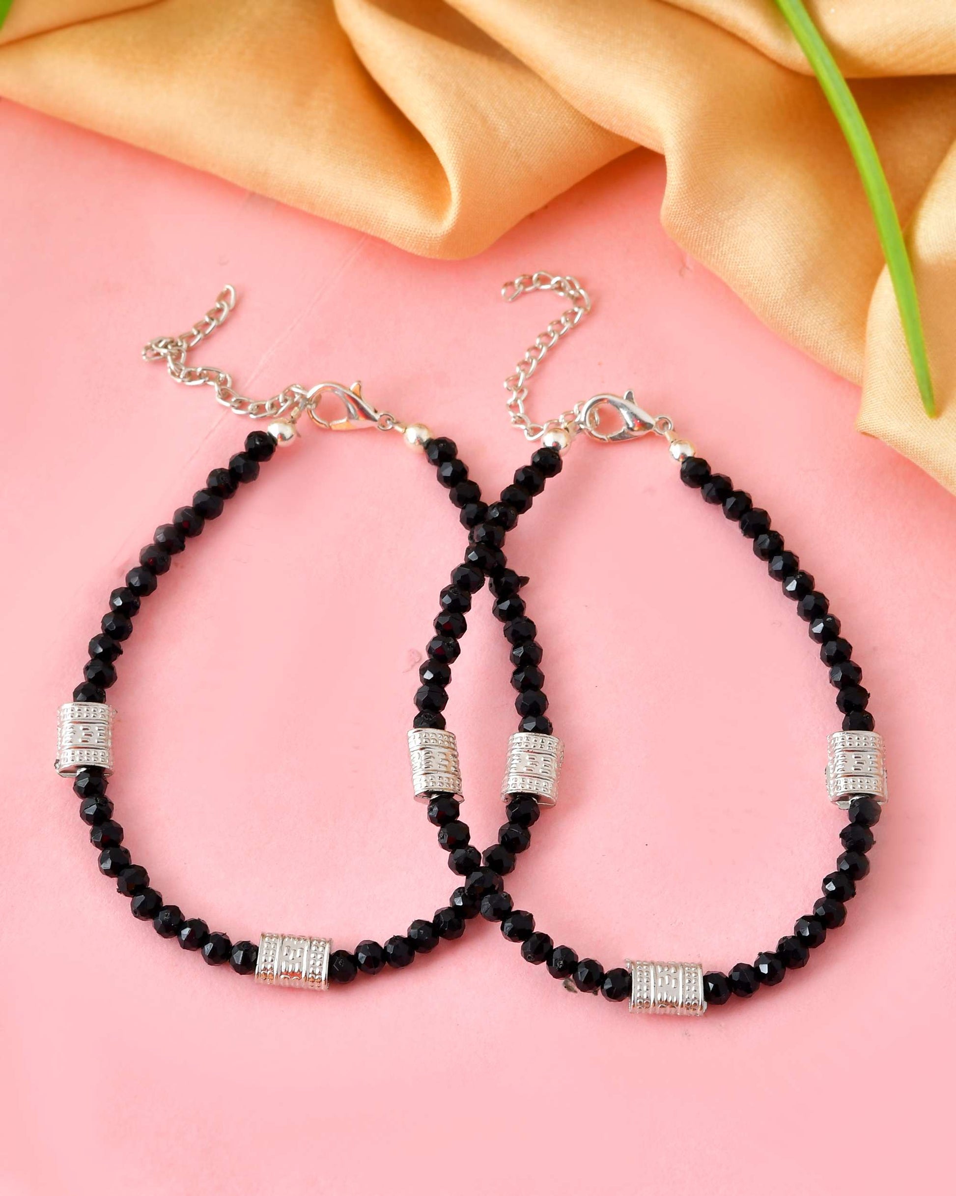 Jewels Nest Set of 2 Silver-Plated Anklets with Polished Black Beads and Barrel Charms 