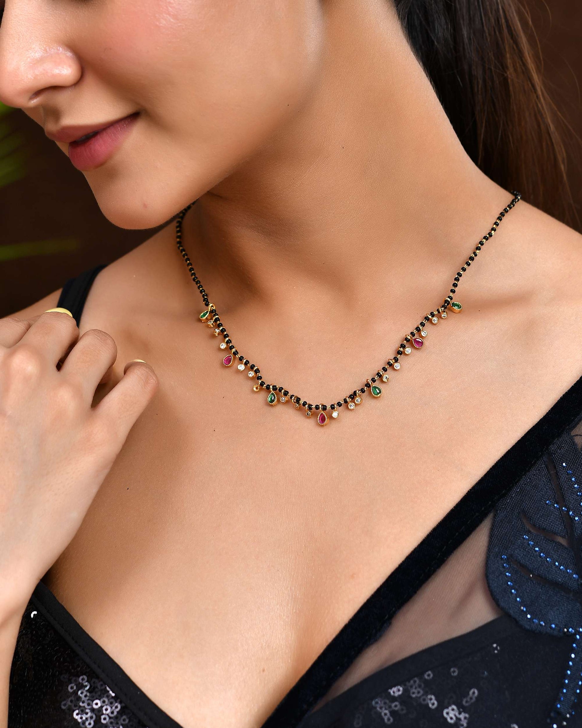 Jewels Nest Elegant Black Beads Mangalsutra with Green & Red Stone Drops – Silver Finish 