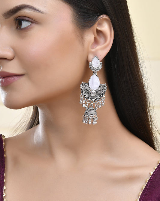 Jewels Nest Oxidized Silver Half Moon Jhumka Earrings with Intricate Design Jewels Nest