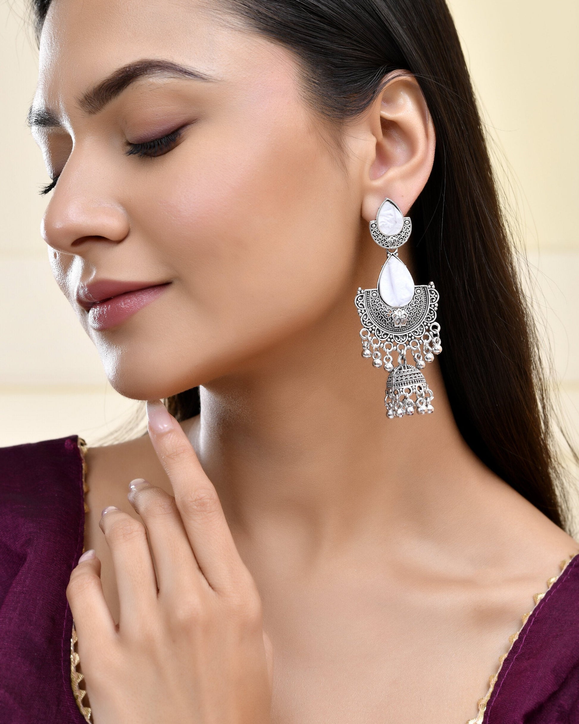 Jewels Nest Oxidized Silver Half Moon Jhumka Earrings with Intricate Design Jewels Nest