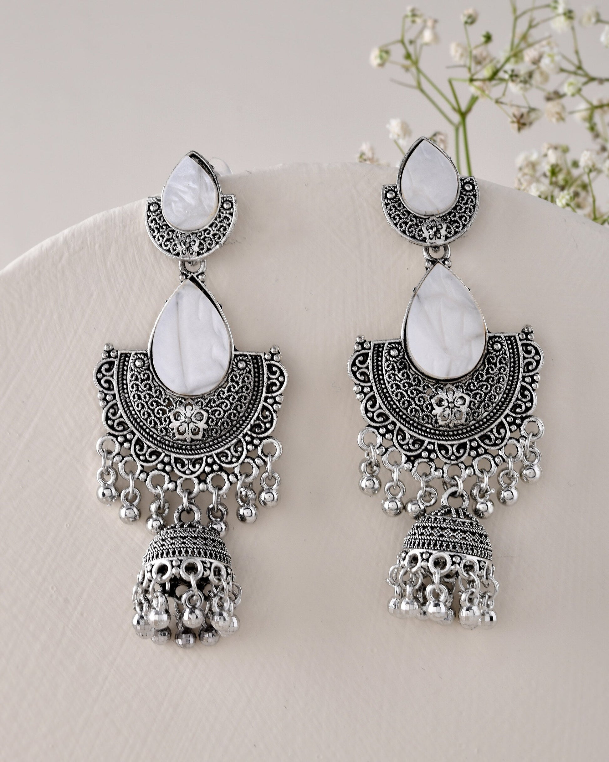 Jewels Nest Oxidized Silver Half Moon Jhumka Earrings with Intricate Design Jewels Nest