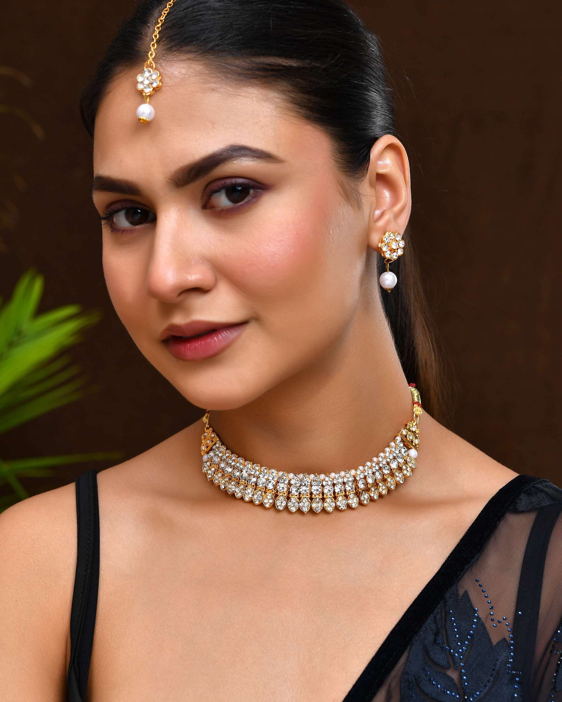 Jewels Nest Gold-Plated American Diamond Studded & Beaded Choker Jewellery Set Jewels Nest