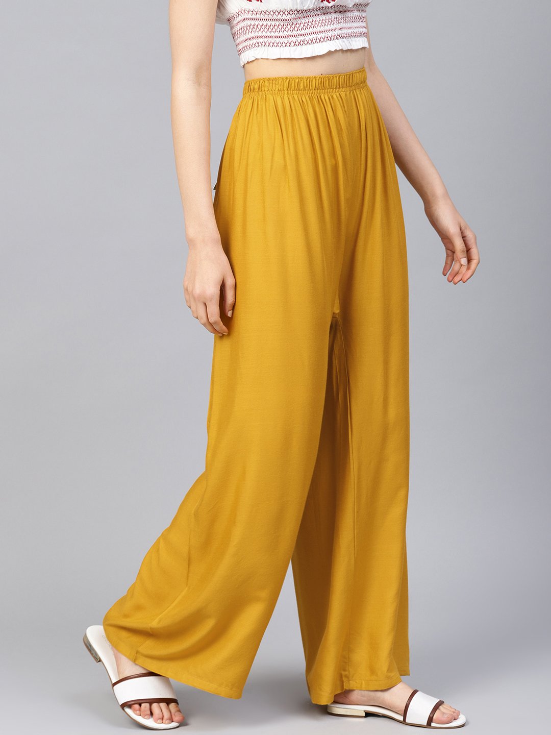 Jompers Women Mustard Solid Straight Palazzos