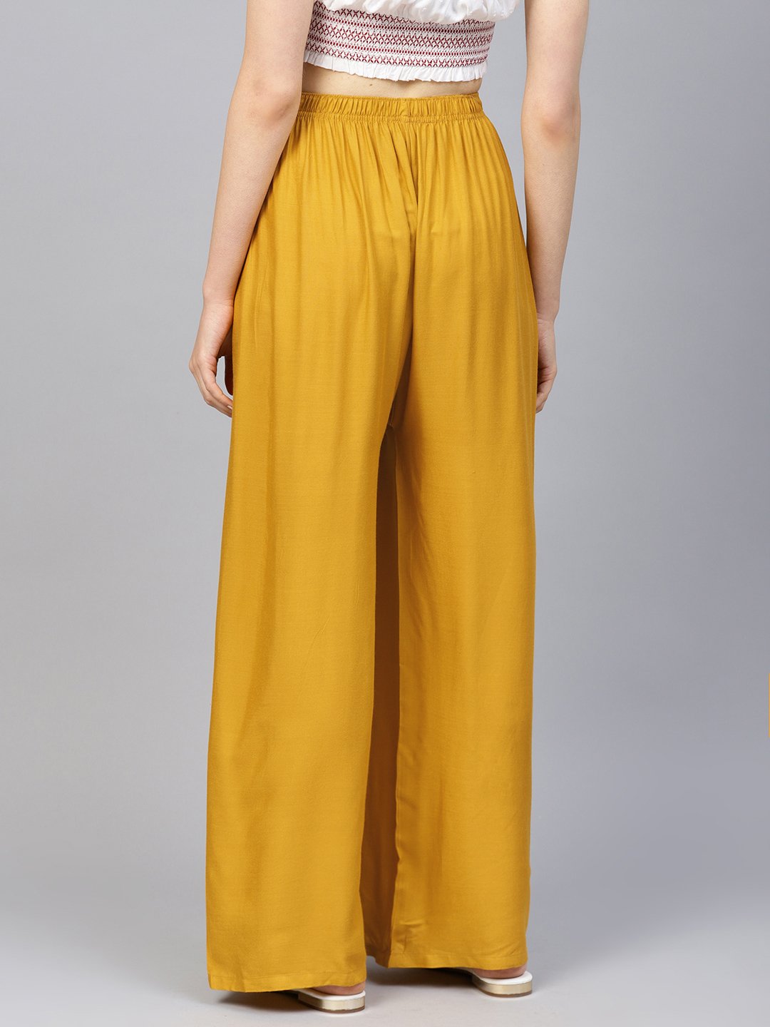 Jompers Women Mustard Solid Straight Palazzos