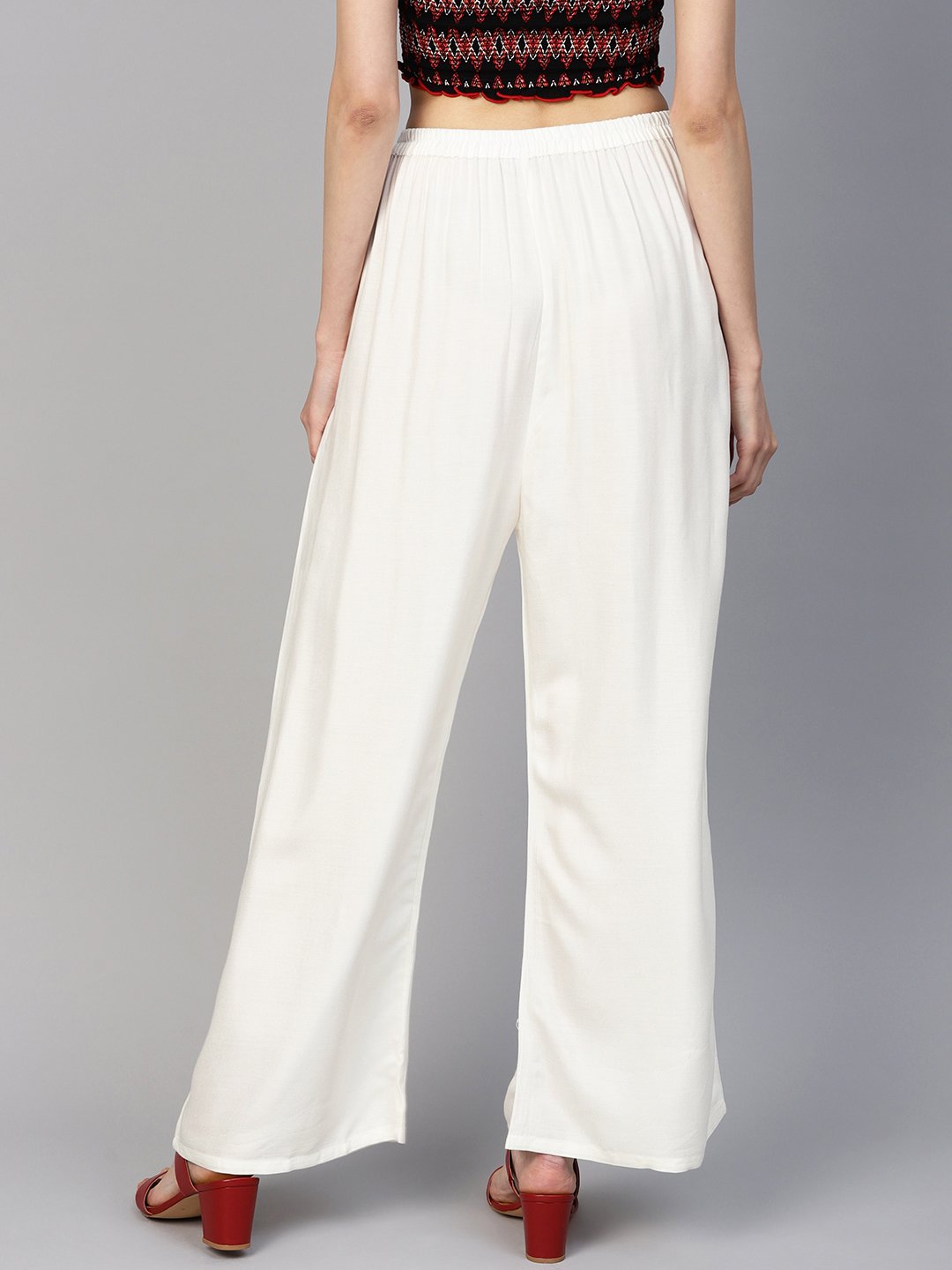 Jompers Women Off-White Solid Straight Palazzos