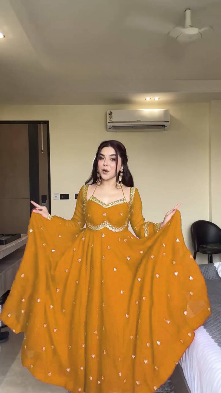 Evanik Yellow Faux Georgette With Embroidery Sequence Work Anarkali Suit