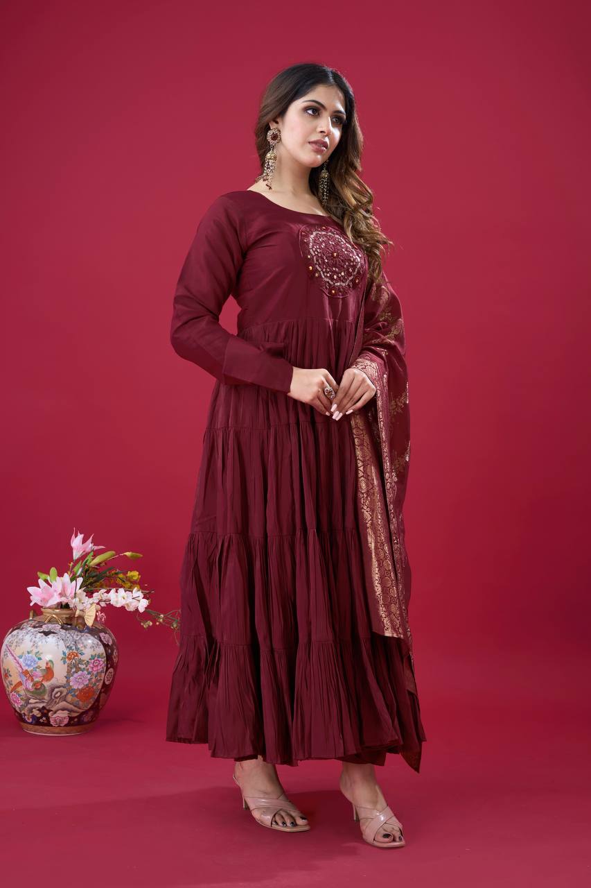 Teeya Creation Maroon Colour Heavy Roman Silk Gown With Jacquard Dupatta