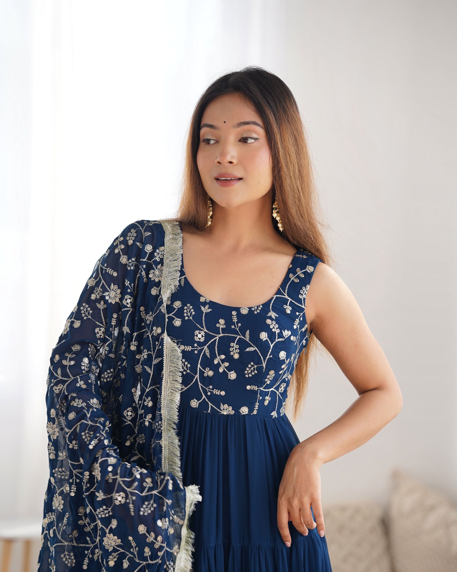 Teeya Creation Blue Color Faux Georgette Heavy Work 12 Meter Flared Fully Stitched Gown