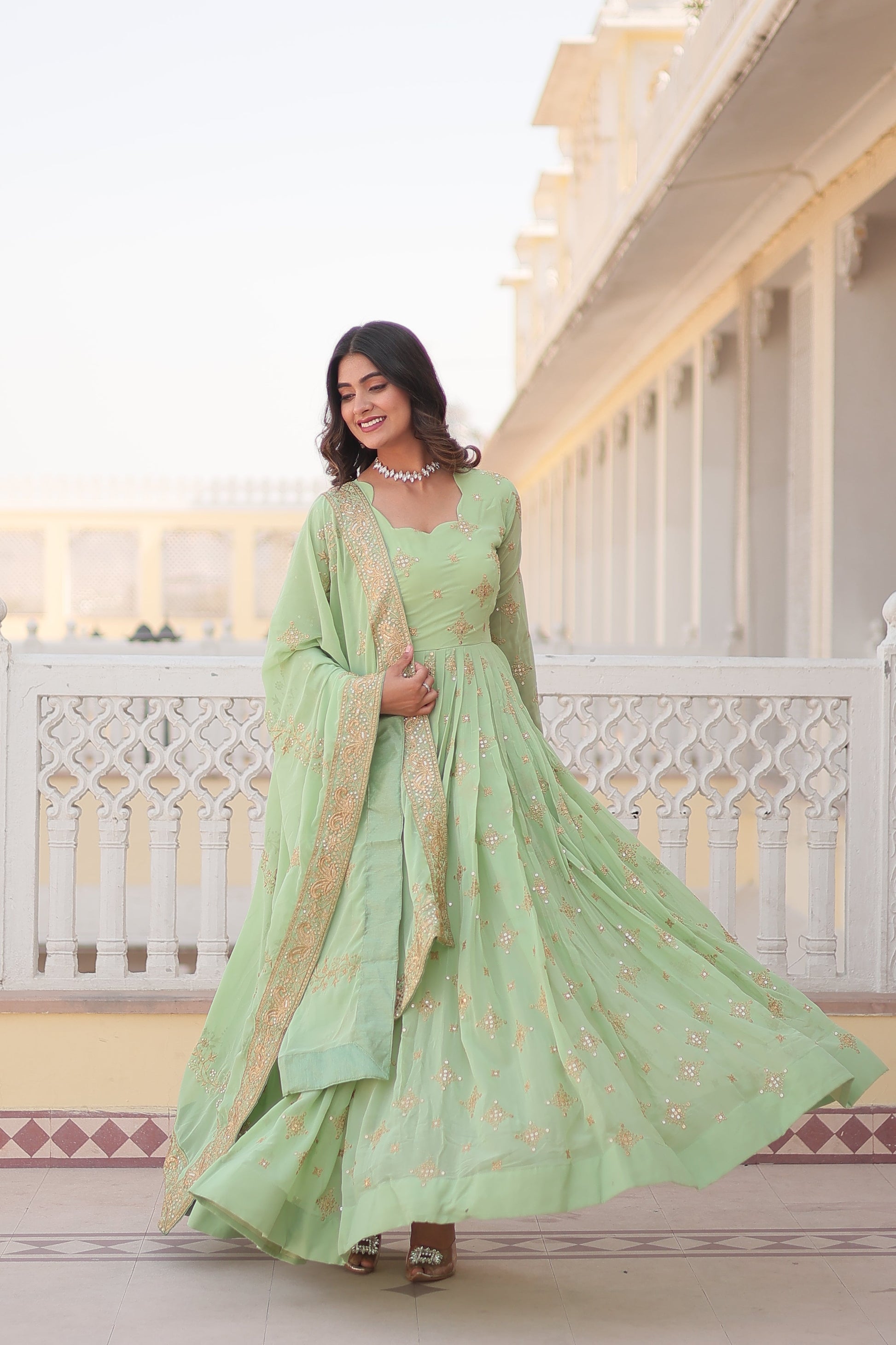 Teeya Creation Pista Color Faux Georgette Beautiful Embroidery Work Fully Stitched Gown