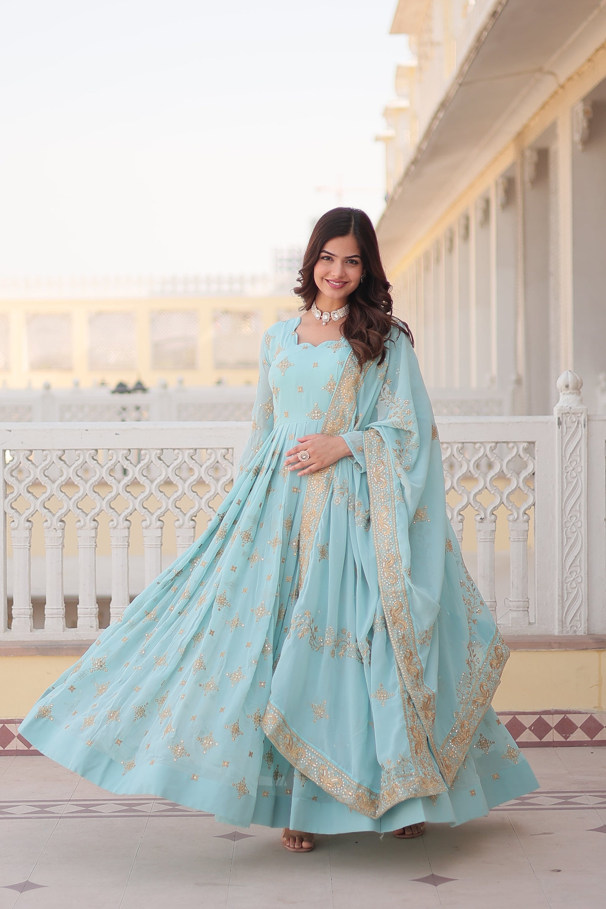Teeya Creation Sky Color Faux Georgette Beautiful Embroidery Work Fully Stitched Gown