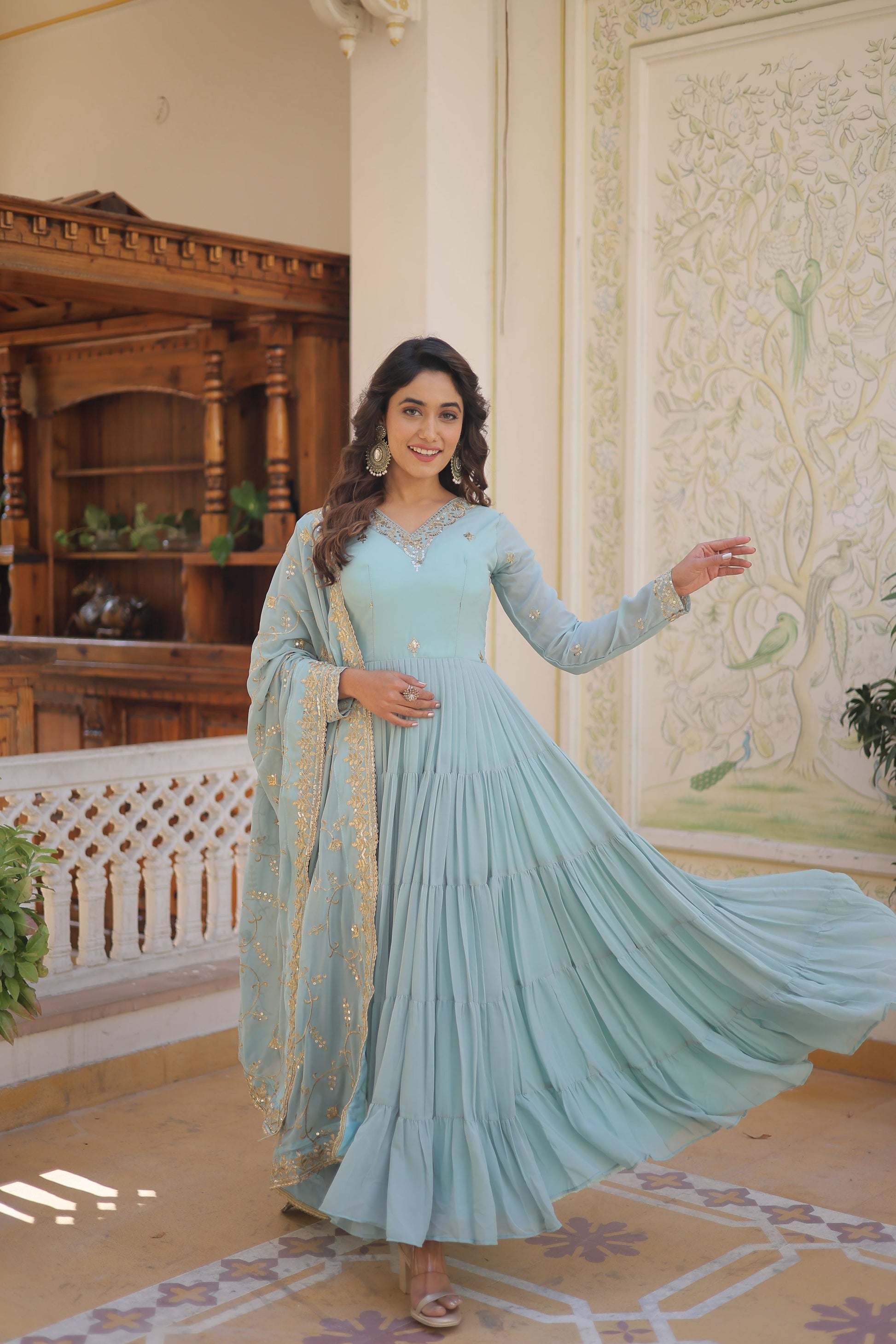 Teeya Creation Sky Color Faux Georgette Heavy Work Fully Stitched Gown