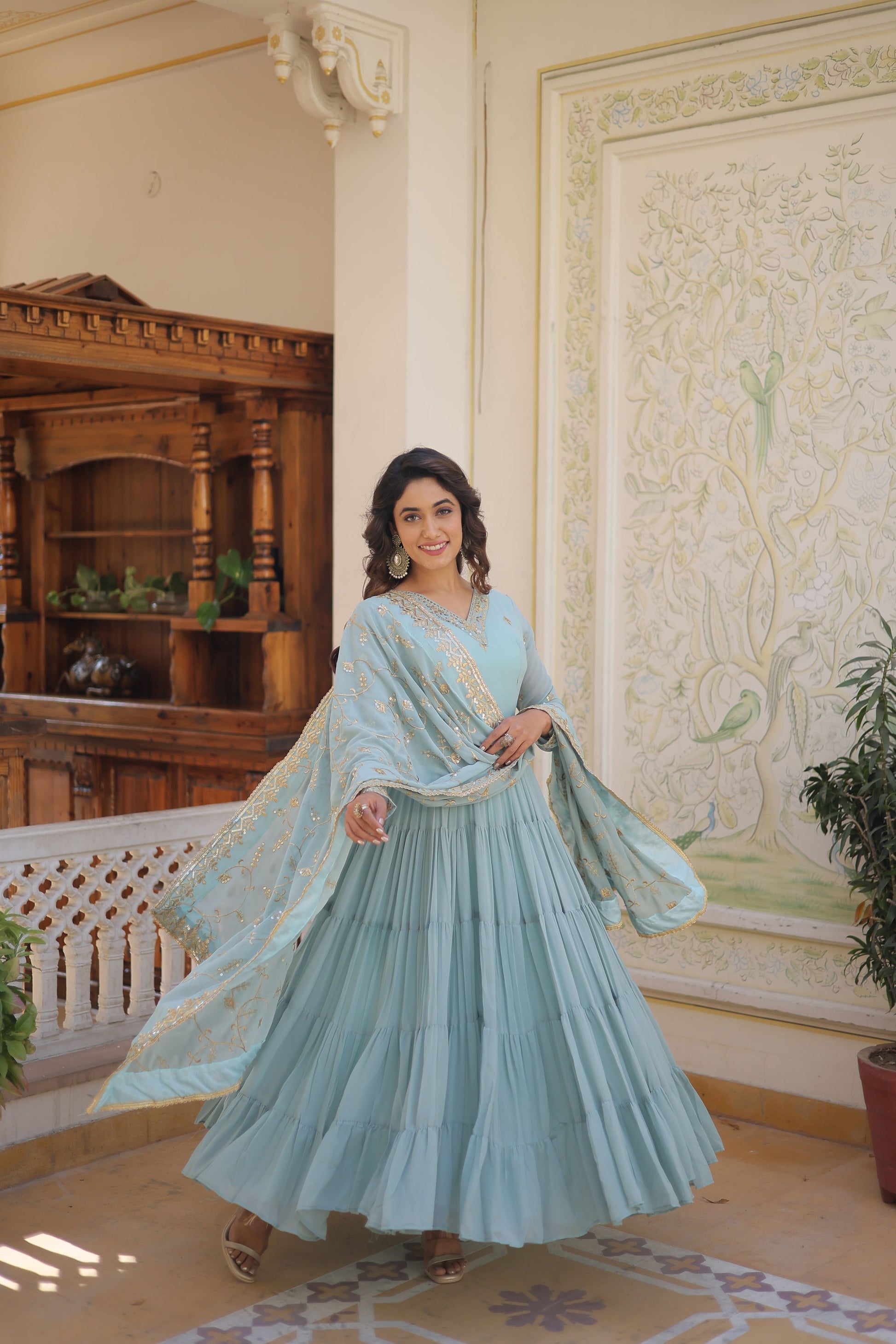 Teeya Creation Sky Color Faux Georgette Heavy Work Fully Stitched Gown