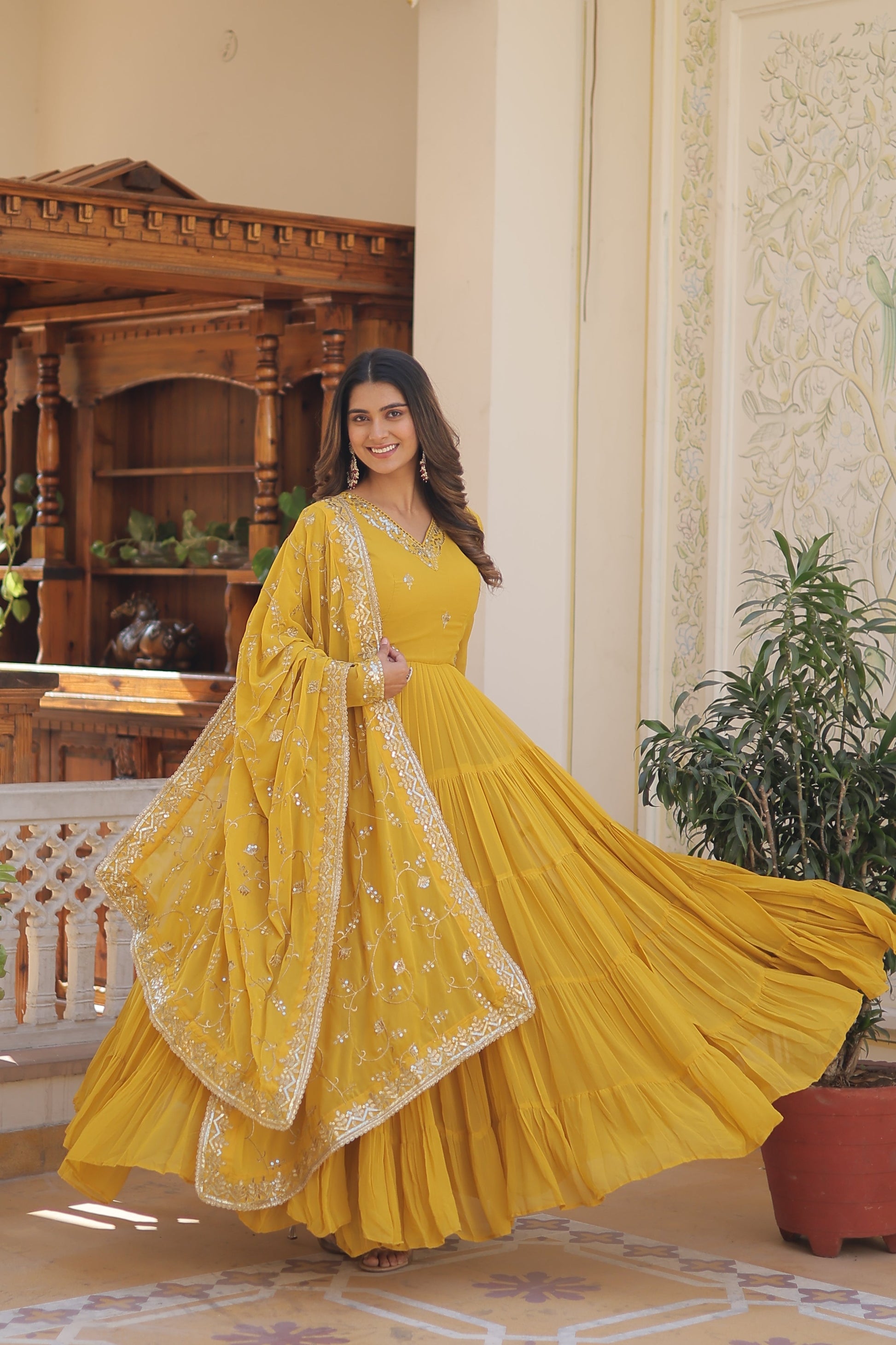 Teeya Creation Yellow Color Faux Georgette Heavy Work Fully Stitched Gown