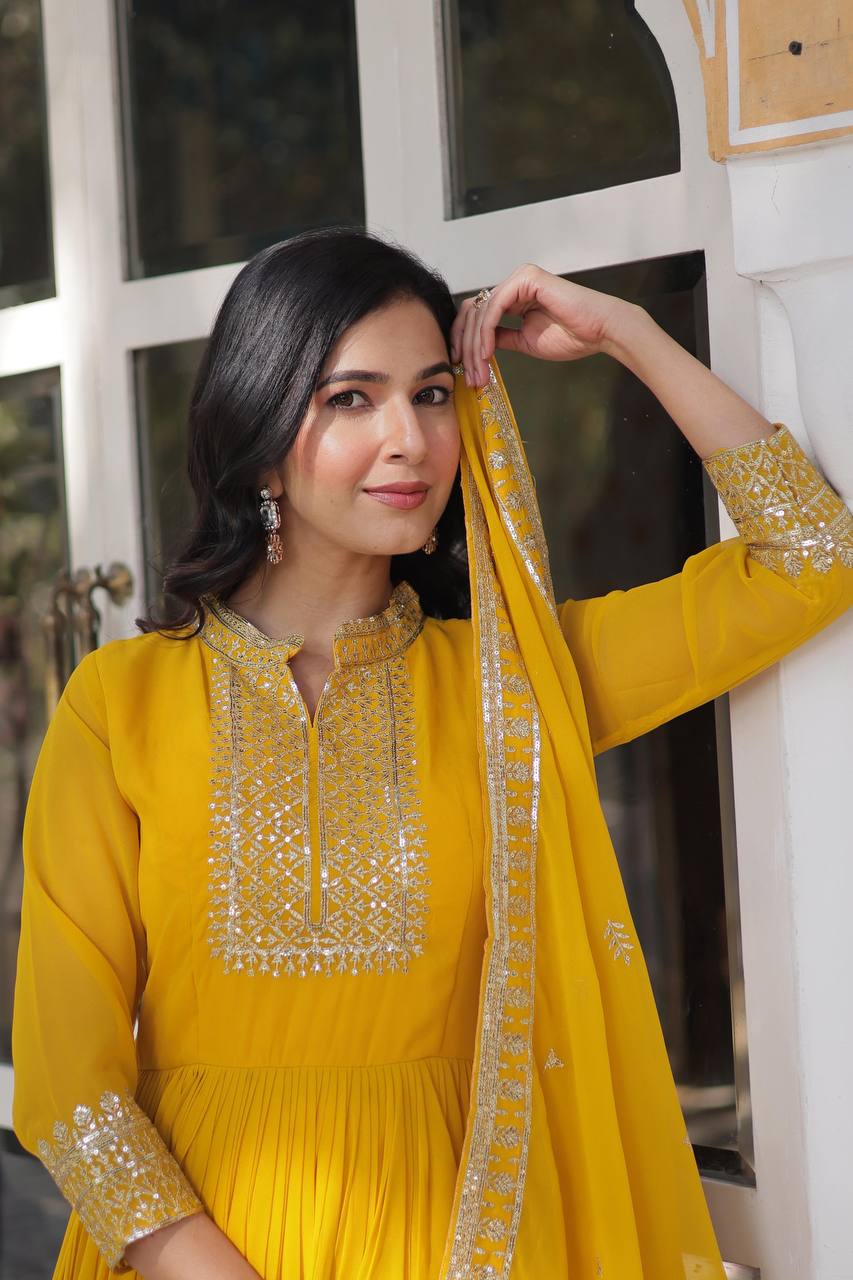 Teeya Creation Yellow Color Faux georgette Heavy Embroidery Work Fully Stitched Gown
