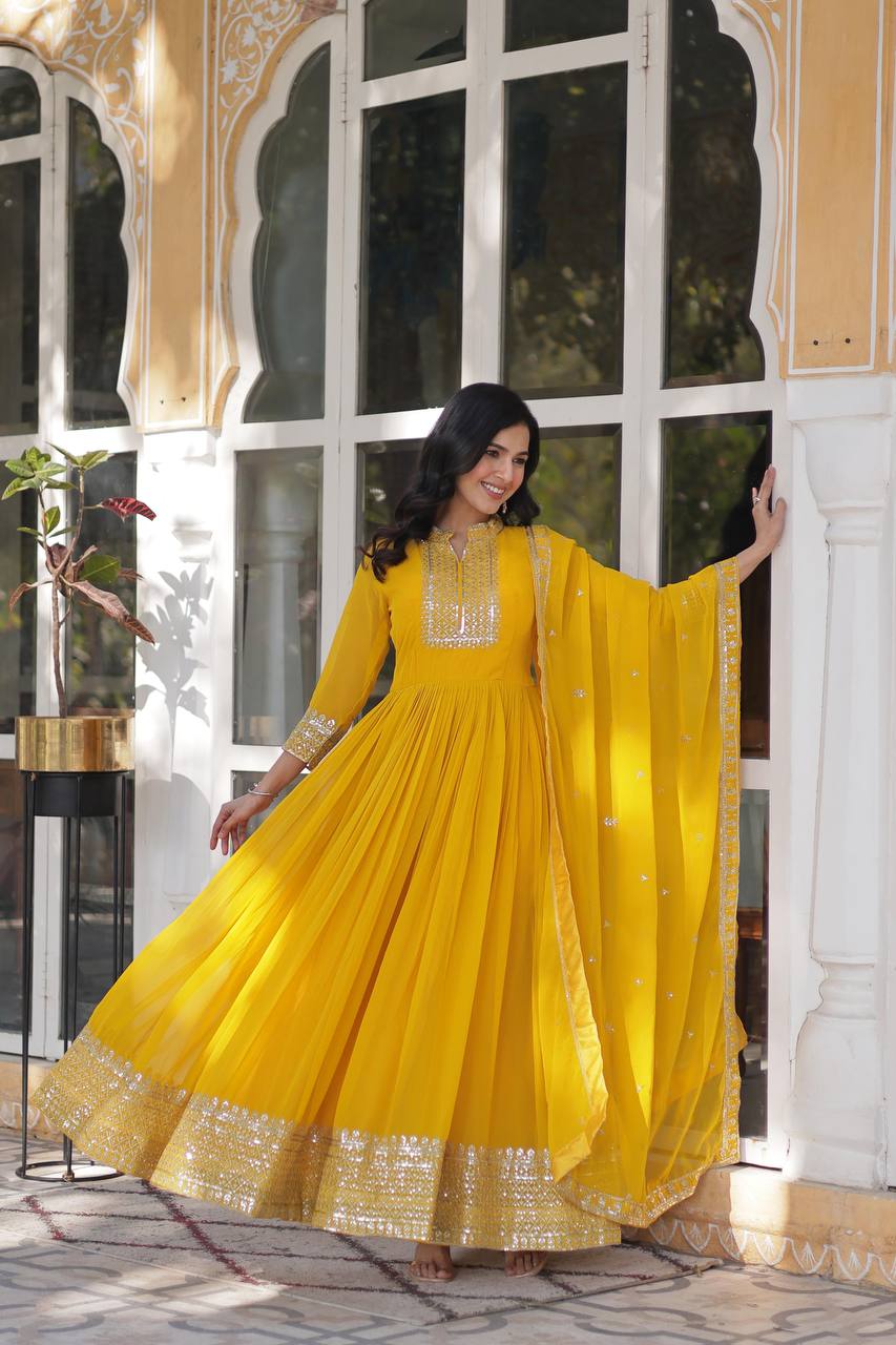 Teeya Creation Yellow Color Faux georgette Heavy Embroidery Work Fully Stitched Gown