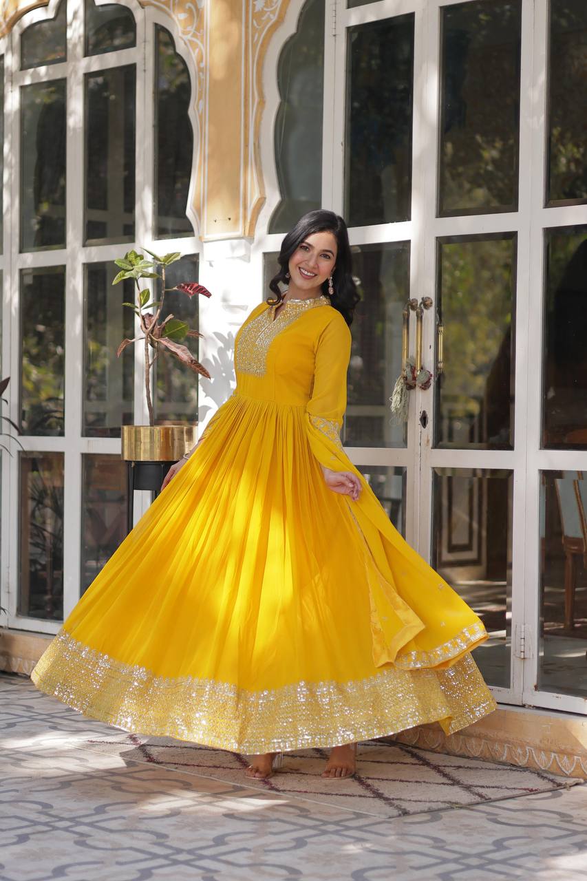 Teeya Creation Yellow Color Faux georgette Heavy Embroidery Work Fully Stitched Gown