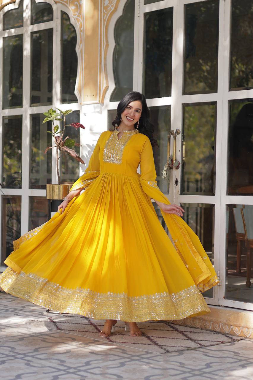 Teeya Creation Yellow Color Faux georgette Heavy Embroidery Work Fully Stitched Gown